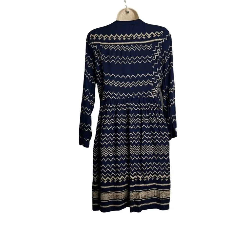 Holding Horses Anthropologie Navy and tan graphic print long sleeve dress